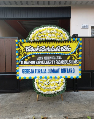 Papan Bunga Duka di Tombariri